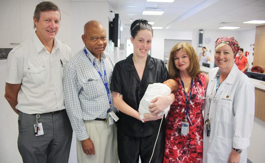 Simone Brown and baby Zane Kanowski thank their life-saving specialists: (from left) Surgeon Dr Alan Atherstone, Obstetrician/Gynaecologist Dr Edwin Ozumba and Anaesthetists Dr Deborah Simmons and Dr Annette Turley. Photo Contributed Simone Brown and baby Zane Kanowski thank their life-saving specialists: (from left) Surgeon Dr Alan Atherstone, Obstetrician/Gynaecologist Dr Edwin Ozumba and Anaesthetists Dr Deborah Simmons and Dr Annette Turley. Photo Contributed